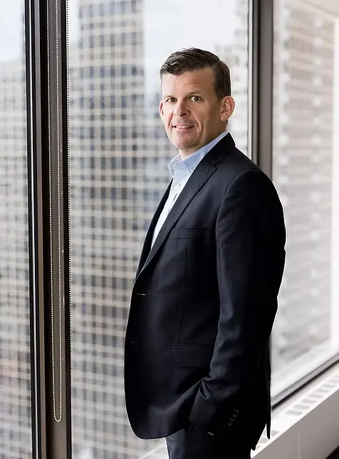 Portrait of Alex Henderson, Senior Partner at Kalos LLP.
